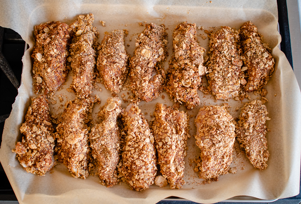 You don't have to leave too much room on the baking tray for these chicken tenders to cook evenly. Just make sure you flip them halfway through!