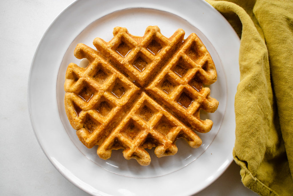 If you have leftover sweet potato in your fridge – turn it into breakfast with a high protein waffles recipe! 