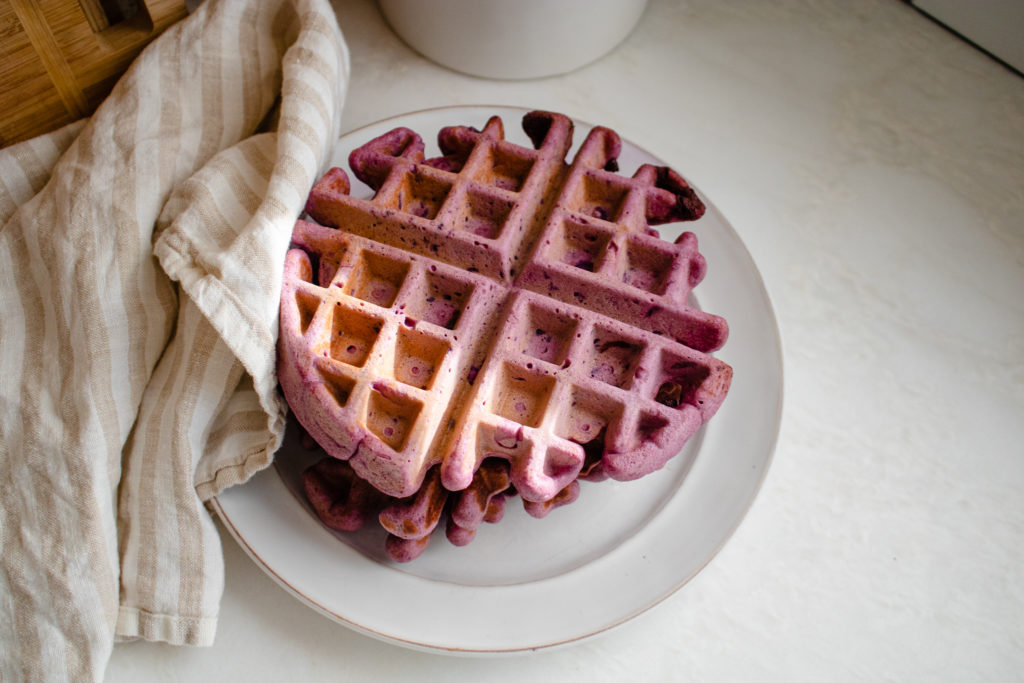 It is so fun to make these waffles using purple sweet potatoes! 